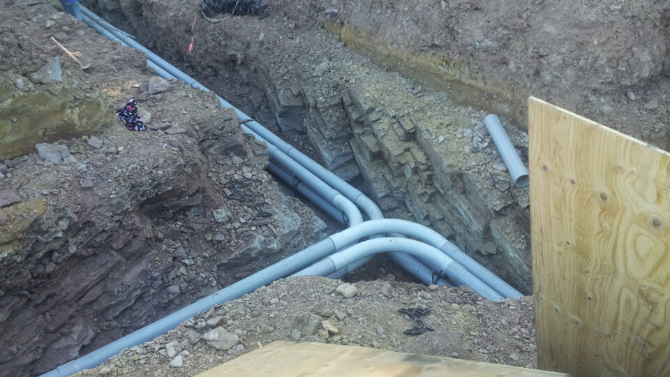 Electrical conduit duct bank laid in an open trench