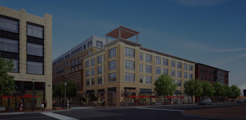 Rendering of a four-story mixed use building on a street corner